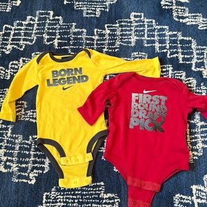 2 Nike baby onesies